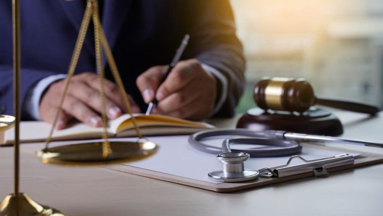 Law gavel stethoscope Health care business rules